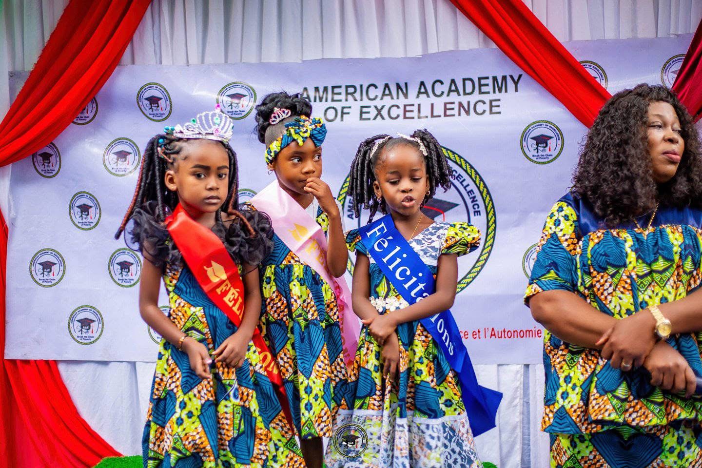 Students on stage at an American Academy of Excellence event